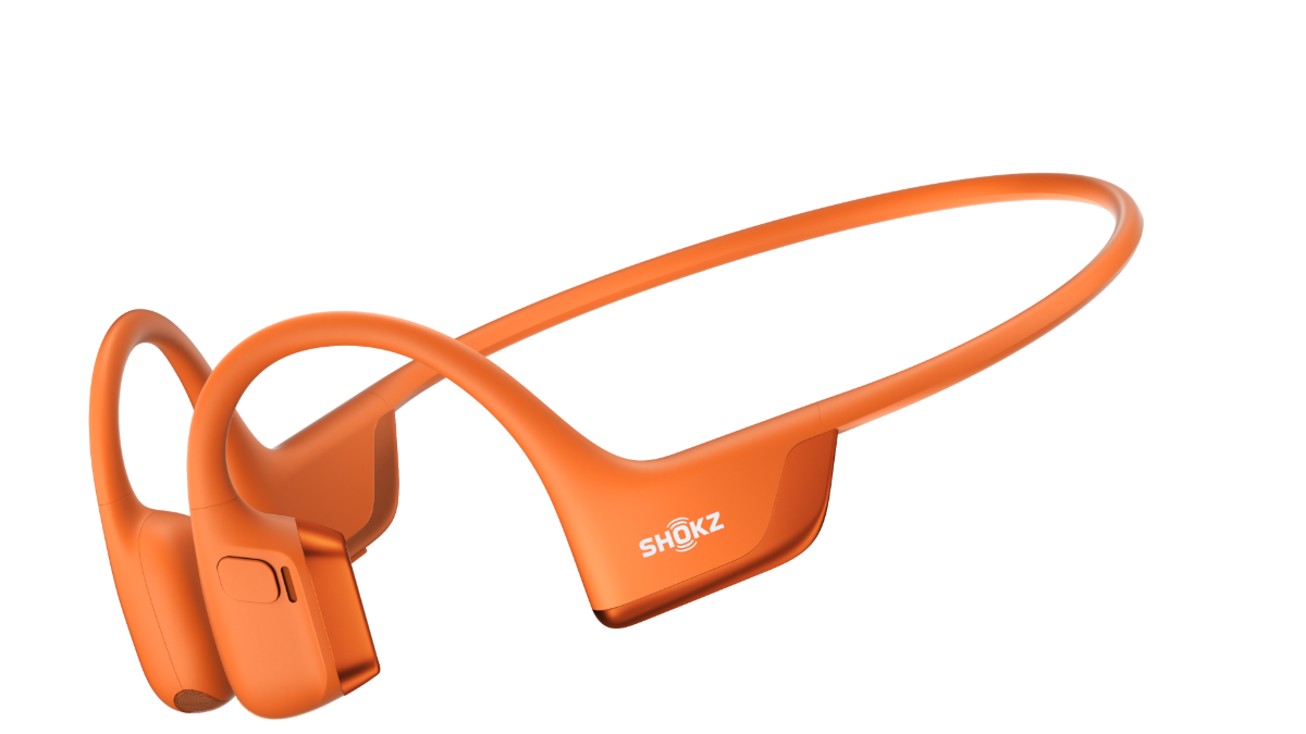 Orange bone conduction wireless earplugs with a matching neckband, featuring the SHOKZ brand logo, shown on a solid white background.