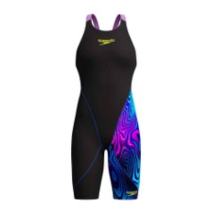 A Speedo women's one-piece racing swimsuit in black, featuring a vibrant purple, blue, and pink abstract swirl pattern on the lower legs, with a yellow Speedo logo on the chest.