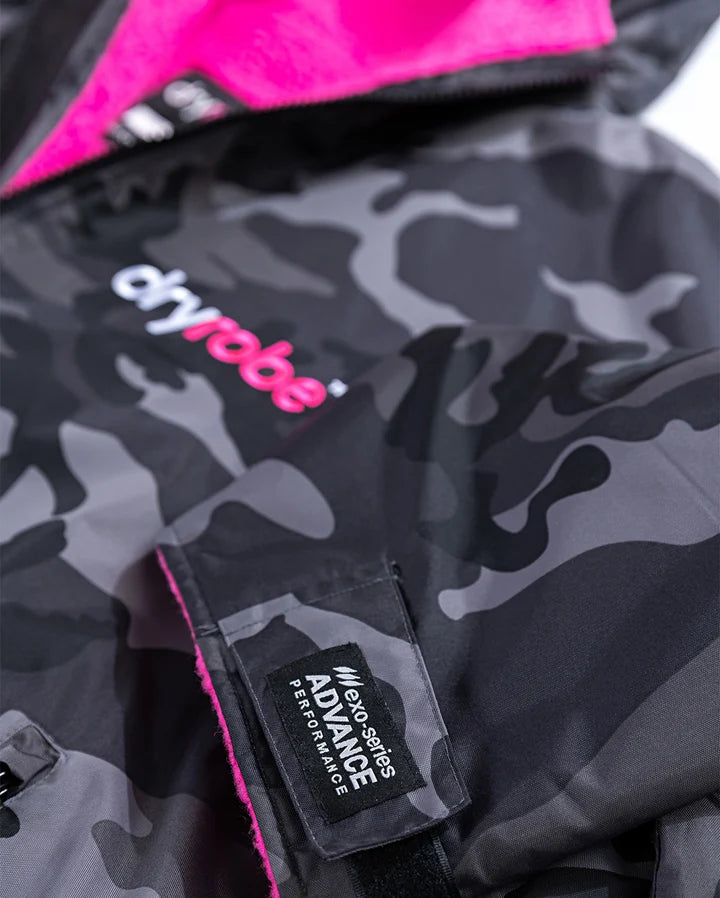 Black camouflage jacket with 'dryrobe' logo and 'Advance Sports Performance' label.